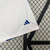 Calção branco masculino da seleção italiana de futebol, da marca Adidas, com detalhes em azul e logo da Itália.