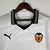 Camisa branca do Valencia CF, modelo 2023/2024, com logo da Puma e patrocinadores na frente.