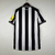 camisa-newcastle-i-2023-2024-masculina-torcedor-preta-e-branca-titular-primeiro