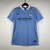 Camisa retrô masculina do Manchester City, modelo 2015/2016, na cor azul, com logo da Puma e estampa do patrocinador Etihad Airways.