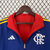 Agasalho corta vento Flamengo dupla face em azul e vermelho, com logo da Adidas e detalhes em amarelo.