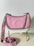 Bolsa Coach rosa con cadena