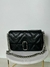 Bolsa Marc Jacobs negra con cadena plata