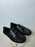 Mocasines coach color negro con herraje en color plata