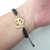 Pulsera Símbolo Om Tejida Negra Ajustable COD LQ-B0I7-NWT0