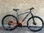 Bicicleta Aro 29X17 (M) - Roma - Cinza/Laranha - GTI - 3x7v - 21 Velocidades - Freio a Disco Mecanic