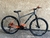 Bicicleta Aro 29X19 (G) - Roma - Cinza/Laranha - GTI - 3x7v - 21 Velocidades - Freio a Disco Mecanic