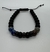 Pulsera de color negra con cuentas azules y circonias negras - comprar en línea