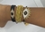 Set pulseras ojo tuco negro dorado