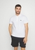 POLO LACOSTE CLASSIC FIT L12.12 PIQUET ORIGNAL BRANCO - comprar online