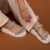 BIRKEN BANANINHA OFF WHITE na internet