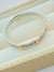 PULSEIRA BRACELETE BOLINHAS PRATA COM DETALHE DOURADO FOLHADO A OURO