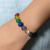 Pulseira de Pedra Vulcânica com 7 chakras na internet