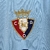 Camisa azul do Osasuna III 23/24, modelo torcedor da Adidas, com detalhes em azul escuro e logotipo do time.

