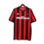 Camisa retrô do AC Milan 1990/1991, masculina, nas cores vermelha e preta, com detalhes em preto e logotipo da Adidas.