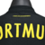 Camisa preta do Borussia Dortmund II 23/24, modelo masculino, com detalhes em amarelo e logo da Puma.

