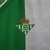 Camisa do Real Betis II 22/23, verde com detalhes em branco e dourado, confeccionada pela Hummel.

