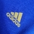 Camisa azul do Cruzeiro I 21/22 da Adidas, modelo masculino, com detalhes em dourado e nas mangas.