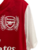 Camisa retrô do Arsenal, modelo 2011/2012, na cor vermelha com detalhes em branco e logo da Nike.

