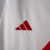 Camisa branca do River Plate com detalhes em vermelho e logotipo do time, modelo 23/24 para torcedores.

