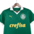 Camisa feminina Palmeiras I 24/25 da Puma, na cor verde, com detalhes em branco e logo do time.