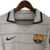 Camisa retrô cinza do Barcelona, modelo away de 03/04, com listras e logo da Nike.

