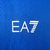 Camisa Napoli Edição Champions 23/24 masculina, azul com detalhes em branco, com estampas de "EA7" e "Campioni d'Italia 22/23".

