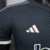 Camisa cinza da Juventus III 23/24, modelo masculino da Adidas, com logo da equipe e detalhes em branco.

