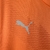 Camisa goleiro laranja do Palmeiras, modelo 23/24, com detalhes em branco e logotipo da Puma.