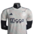 Camisa Ajax Away 23/24 Jogador Adidas Masculina na cor branca, com detalhes em azul e logo da marca.

