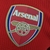 Camisa do Arsenal Home 22/23, modelo masculino da Adidas, nas cores vermelho e branco, com logotipo e detalhes do time.

