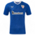 Camisa masculina azul do Athletic Bilbao, modelo I 24/25, com logo da Castore e estampa de fundo.