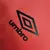 Camisa longa do Athletico Paranaense na cor vermelha com detalhes em preto e logo da Umbro

