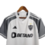 Camisa branca do Atlético Mineiro II 23/24 com detalhes em cinza e logo da Adidas.

