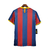 Camisa retrô do FC Barcelona, modelo home 10/11, nas cores azul e vermelho, com detalhes em amarelo e logotipo da Nike.

