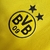 Camisa amarela do Borussia Dortmund I 23/24, modelo torcedor masculino, com detalhes em preto e logo da Puma.

