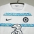 Camisa branca do Chelsea II 22/23, modelo torcedor masculino da Nike, com detalhes em azul e logotipo do clube.

