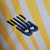 Camisa FC Porto Away 22/23 masculina, modelo em amarelo, com detalhes em azul e logotipo do time.

