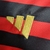 Camisa vermelha do Flamengo Edição Especial 23/24, com listras em preto e detalhes em dourado.