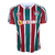 Camisa masculina do Fluminense para torcedores, nas cores verde, grená e branco, com logo da Umbro e patrocinador Betano.