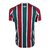 Camisa masculina do Fluminense para torcedores, nas cores verde, grená e branco, com logo da Umbro e patrocinador Betano.