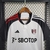 Camisa Fulham Home 23/24 branca com detalhes em preto e vermelho, confeccionada pela Adidas, para torcedores masculinos.

