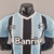 Camisa masculina do Grêmio, modelo I 22/23, nas cores azul e preto, com logo da Umbro e patrocínio da Banrisul.