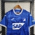 Camisa do Hoffenheim I 23/24 para torcedores masculinos, na cor azul, com detalhes em branco e logo da equipe.

