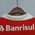 Camisa vermelha do Internacional, modelo 22/23, da Adidas, com logo do clube e patrocinador Banrisul.

