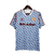 Camisa retrô do Manchester United Away 91/93, na cor azul e branco, com detalhes em vermelho e logo da Adidas.