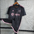 Camisa preta do Inter Miami, modelo away 23/24, com detalhes em rosa e logotipo da Adidas.

