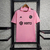 Camisa rosa do Inter Miami, modelo home 23/24, da Adidas, com logotipos e detalhes em preto.

