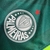 Camisa regata verde do Palmeiras, modelo 23/24, com detalhes em neon e logo da Puma.