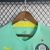 Camisa Palmeiras III 22/23 Torcedor Puma Masculina na cor verde esmeralda, com logo do Palmeiras e detalhes em amarelo.